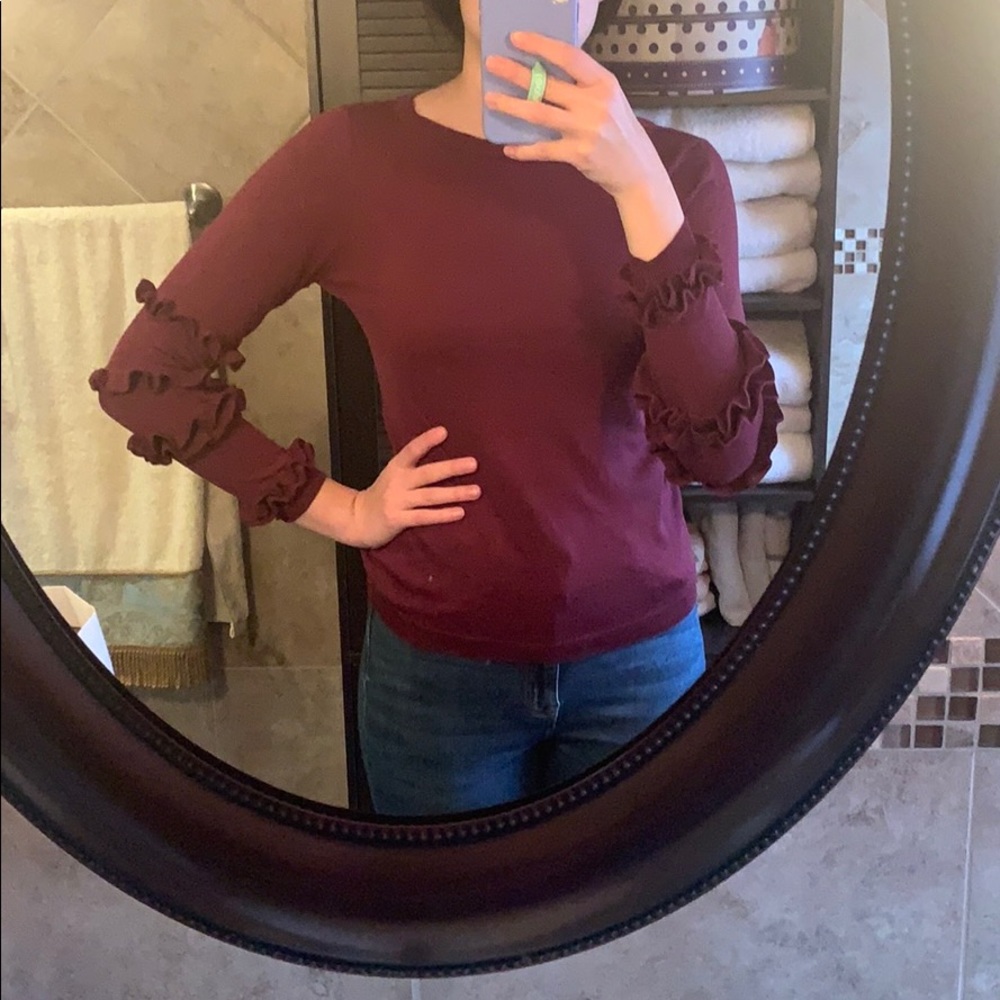 Maroon sweater with detailed sleeves